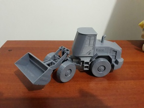 loader toy bulldozer on table heavy machinery industrial truck transport crane tractor excavator machine construction hobby diy mechanical parts 3d print model - Mito3D