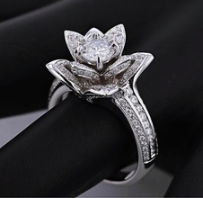 ring flower shaped sprinkled small stones one large stone center wedding marriage jewelry rings 3d print model - Mito3D