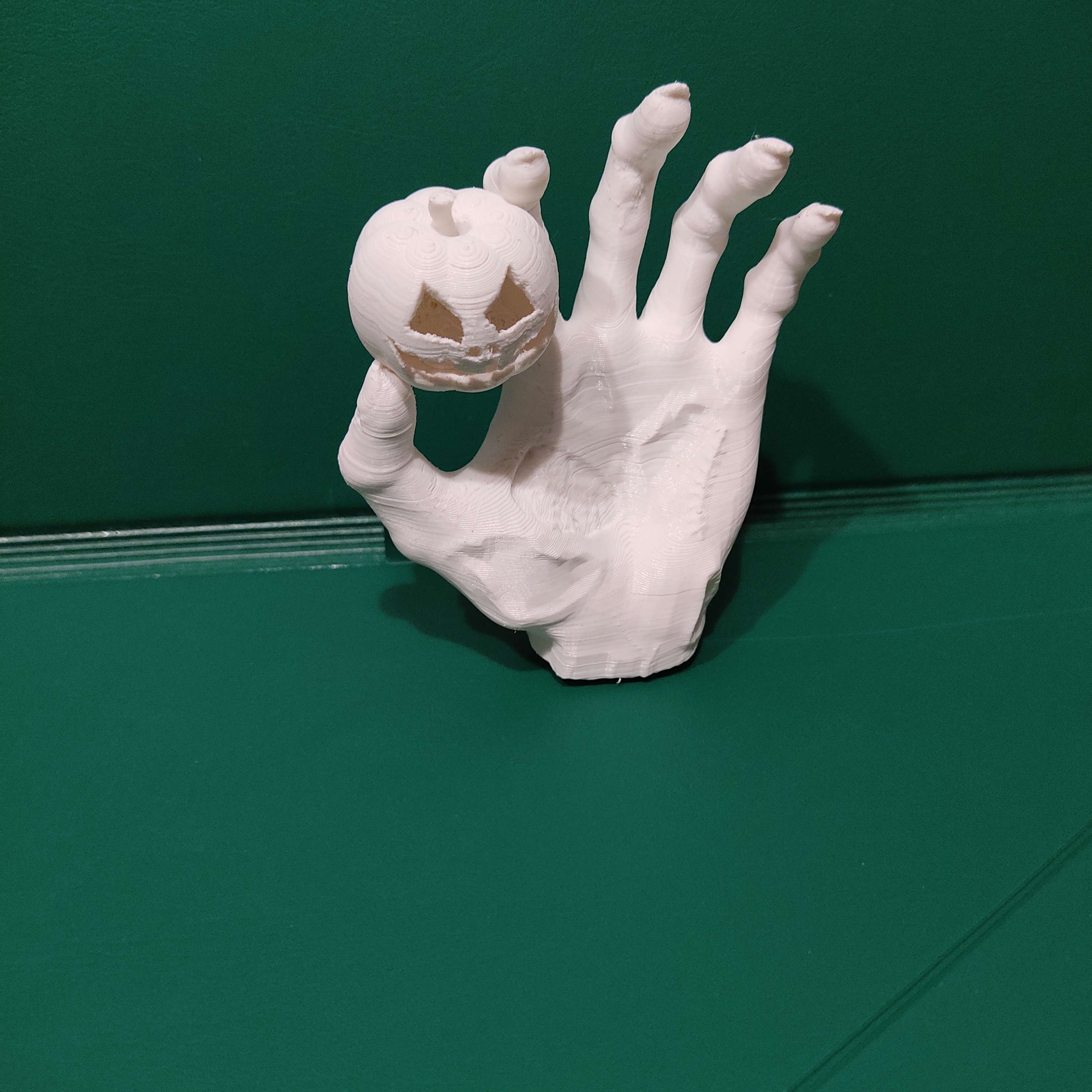 zombie hand catches pumpkin Characters 3D print model - Mito3D