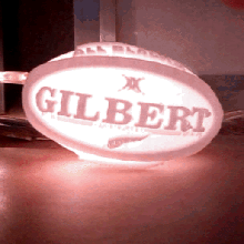 schwarz Rugby Ball Litho Gadget Girlande rubinrot 3d print model - Mito3D
