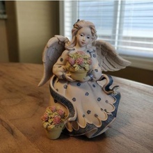 ángel sosteniendo flores art de la decoración jardín ornamento 3d print model - Mito3D
