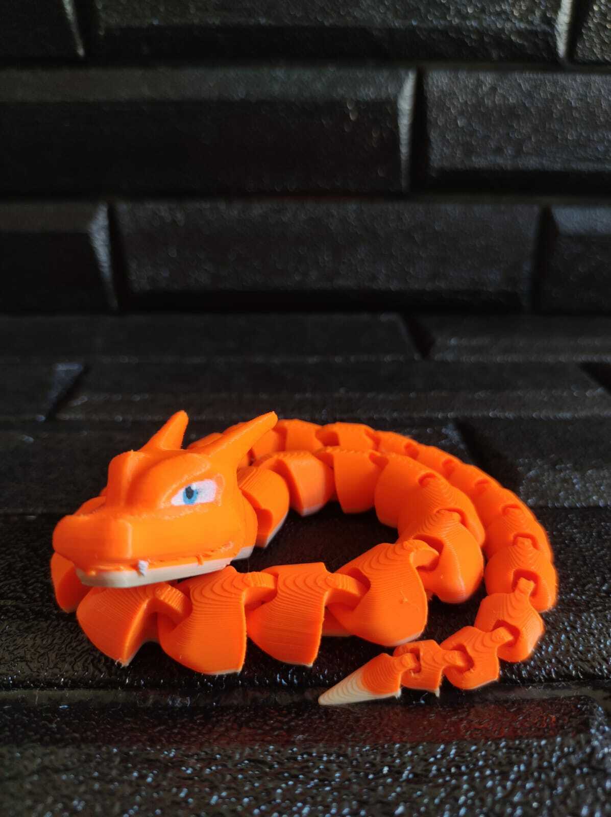articulé dragon charizard impression endroit Jeu Pokémon Pikachu pokeball Feu flamme art fanart jouet conception jouets 3D print model - Mito3D