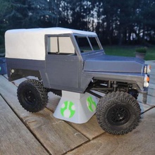 axial racing rc scx24 stand chassis support logo game r c vehicles scale model crawler rccrawler lightweight land rover series landrover hexcrawl halftone commando axialracing 3d print model - Mito3D