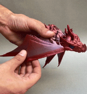 biting dragon art decoration toys bite animals wings fan articulated mechanisms 3d print model - Mito3D