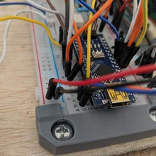 breadboard screw down clip tool prototyping electronics holder 3d print model - Mito3D