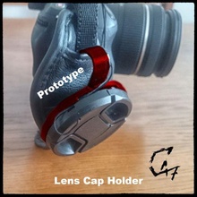 camera lens cap holder clip c47 lensholder strap osłona obiektywu accesories accesory 52mm lenscap cameraaccesories 3d print model - Mito3D