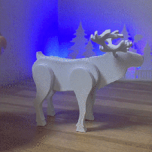 candy dispenser humor gadget reindeer deer noel christmas lol distributor sweets flexi articul flexible flexy skittels 3d print model - Mito3D