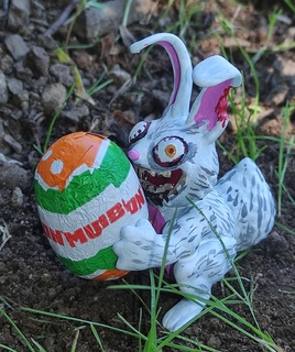 cioccolato raccapricciante coniglio afferrare uovo arte Pasqua conejo pascua huevo adorno ragazzi niños 3d print model - Mito3D