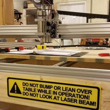 cnc - table warning sign do not bump lean over look laser beam art signs logos signage 3d print model - Mito3D