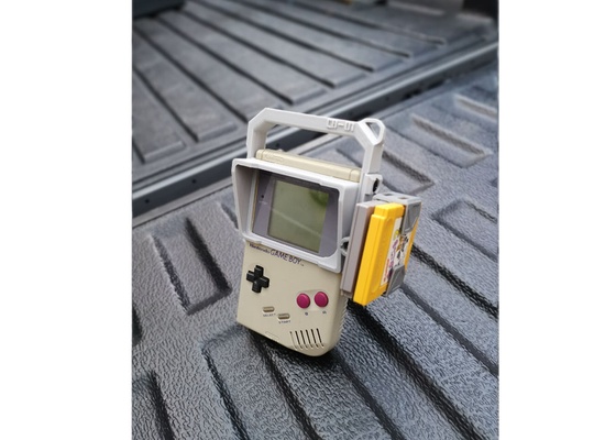 cyber boy gameboy capucha encargarse + cb 002 cartucho soporte juego chico cibernético picatinny carril cyberpunk nintendo 3d print model - Mito3D