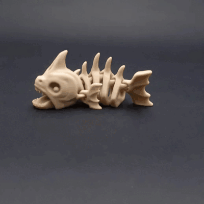 flexi piranha fish skeleton print in place monster articulated toy flexible skull halloween fantasy no supports easy to undead 3d print model - Mito3D