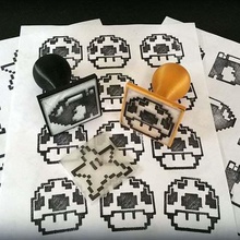 geeky 8bit character rubber stamps art 2d 3d print model - Mito3D