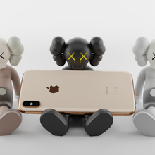 kaws cell phone holder - stand holiday taipei 3d print model - Mito3D