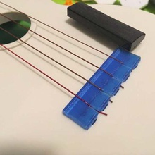 low-action-Sattel-Brücke kala waterman ukulele verschiedene Musik Sattel 3d print model - Mito3D