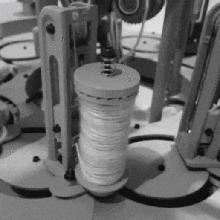 miniature bobbin constant tensioning mechanism gadget manufacturing braider machine 3d print model - Mito3D