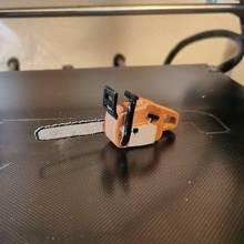 miniature chainsaw gadget tool deco toy 3d print model - Mito3D