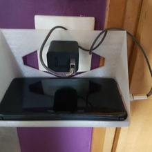 outler cellphone holder smartphone gadget support wall socket outlet 3d print model - Mito3D