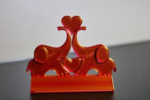 playful elephants holding heart trunks - charming 3d printed figurine celebrating love affection printing elephant animal-themed decor symbol gift idea collectible 3d print model - Mito3D