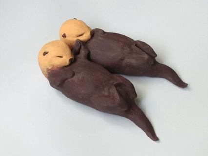 sea otters holding hands otter animal decoration 3d print model - Mito3D