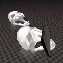 skull phone stand gadget 3d print slash android art creation creative customized decoration dps5005 game halloween holder iphone miniature support openscad ps5 toy toyota 3d print model - Mito3D