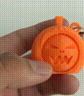 spining face pumpkin keychain halloween fidget print place 3d print model - Mito3D