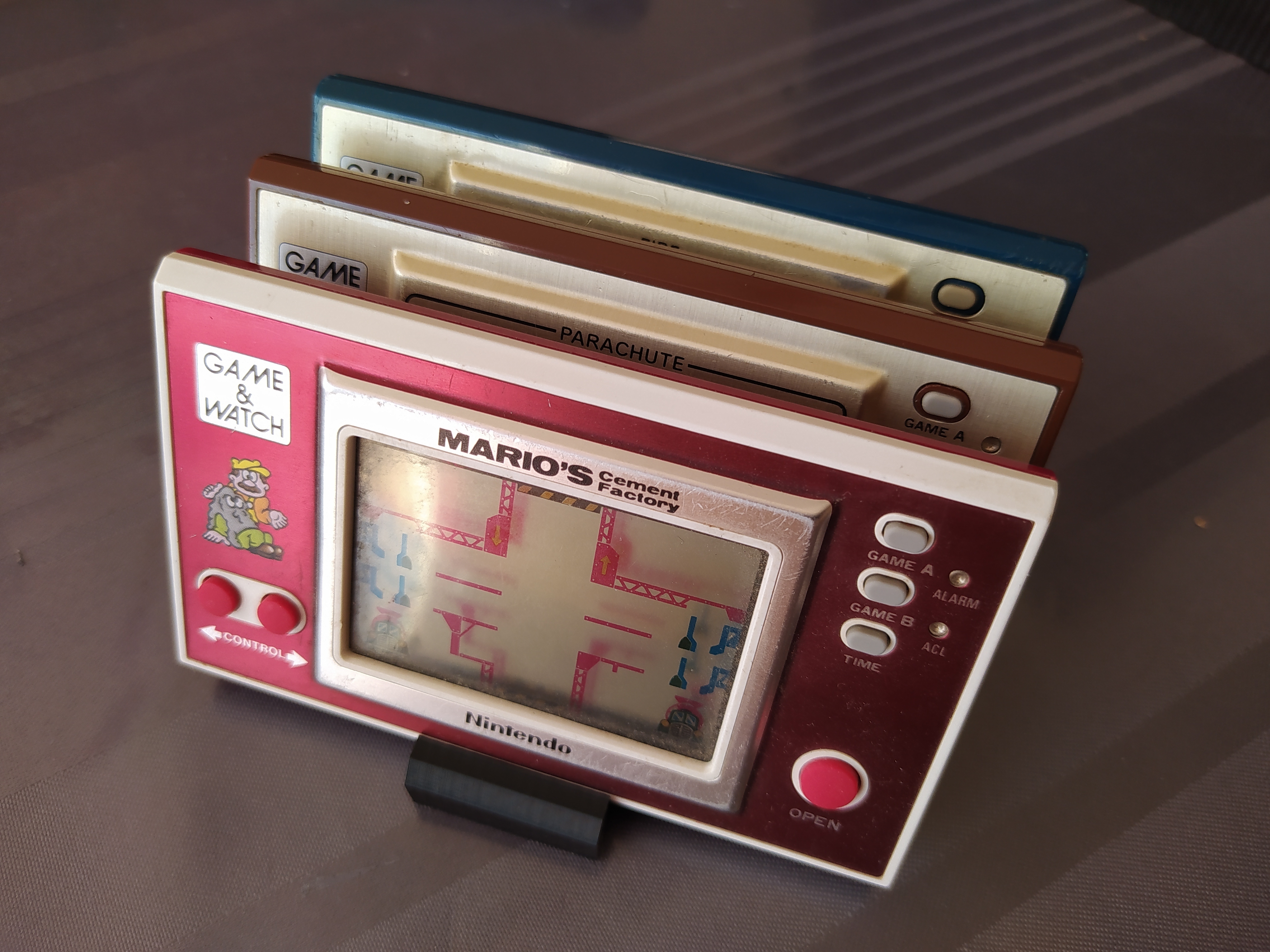 supporto 4 nintendo gioco orologio Giochi video Restituzione giochi Vintage geek 3D print model - Mito3D