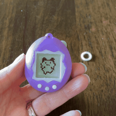 tamagotchi pill container keychain jewelry digital pet key ring vitamin chain holder nostalgic puzzle toy retro video game 3d print model - Mito3D