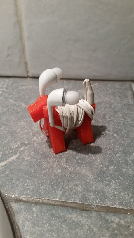 tiny dog tied headphones gadget 3D print model - Mito3D