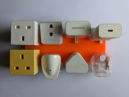 uk plug organiser phone charger uk plug plugs cable organiser cable storage wire caddy plug plug protector  3d print model - Mito3D
