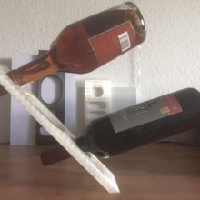 wine bottle holder stand art gravity defying double-bottle balance 3d print model - Mito3D