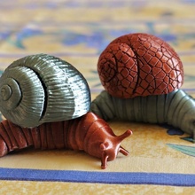 friendly articulated snail 12 shells & garden animal art cute decoration fun funny realistic toy vintage flexible steampunk coral slug flexi 3d print model - Mito3D