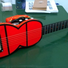 travel guitar built-in amp speaker education travelguitar guitarwithbuilt-inampandspeaker 3d print model - Mito3D