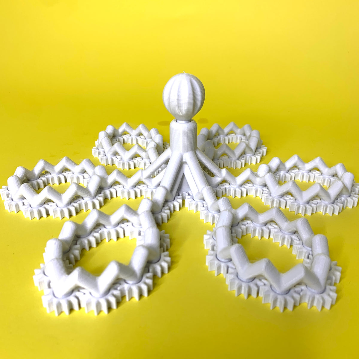 gear flakes - print place stl fun mechanical fidget toy gears arranged circular pattern central knob hold rotated entire frame rotate spin creating 2 completely mesmerizing motions takes flowers up notch thi 3D print model - Mito3D