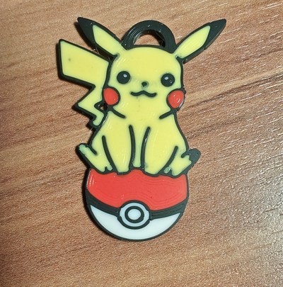 pikachu sitting on pokeball keychain by mholicky art 2d pokemon multicolor mmu ams multimaterial bambu 3d print model - Mito3D