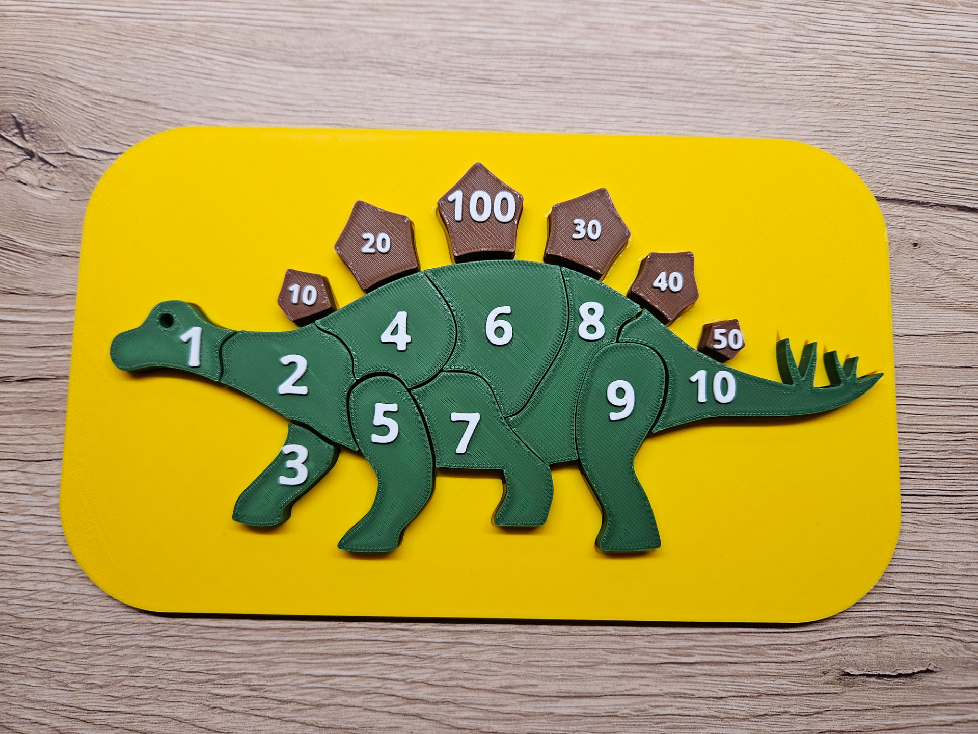 stegosauro puzzle numeri by sergejbubko giocattoli giochi dino dinosauro numero ragazzo adatto bambini 3D print model - Mito3D