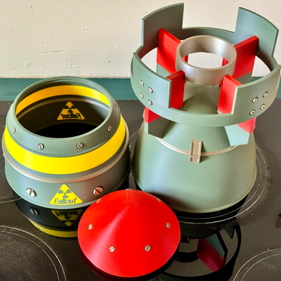 ricaduta mini bomba atomica ams 4 colore stampa remixato by faran3d oggetti scena cosplay replica arma nuke terra desolata puntello fallout4 fallout76 conservazione salvadanaio uomo delle caverne 3d print model - Mito3D