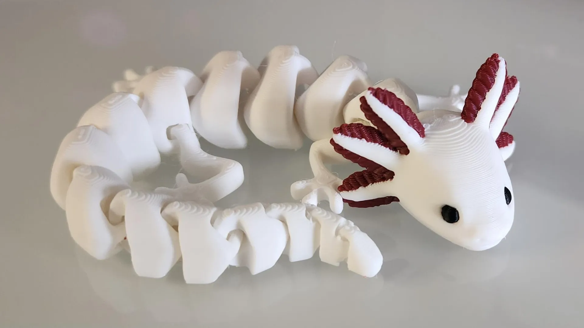 articulated axolotl v2 print in place ams or single color remixed by maker1o1 miniatures animals animal cute flexy flexi flexible printinplace toy multimaterial minecraft 3D print model - Mito3D