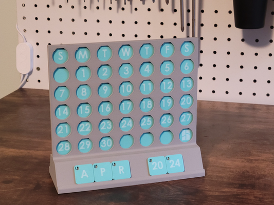connect 2024 calendar game by printmint toys & games 4 2025 2025calendar 3dprintablegame connect4calendar bambu lab filament swatch tile swatches 3d printable functional print customizable toy office holder board 3d print model - Mito3D