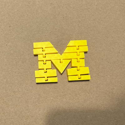 articulated university of michigan block m by jo kingg toys & games uofm football fidget print in place 3d print model - Mito3D