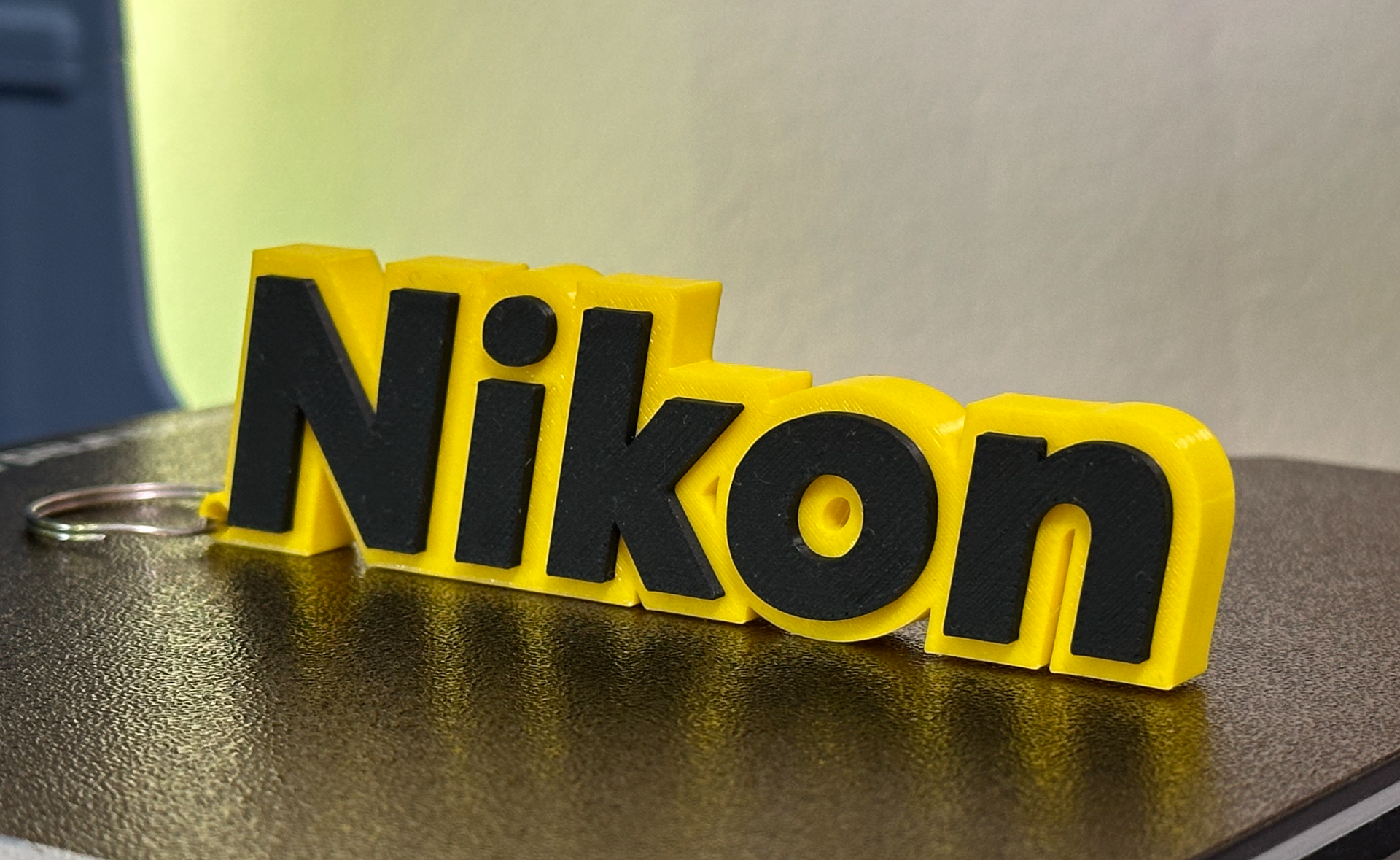 nikon logo keichain by carlo gatto kunst zeichen logos schlüsselbund 3D print model - Mito3D