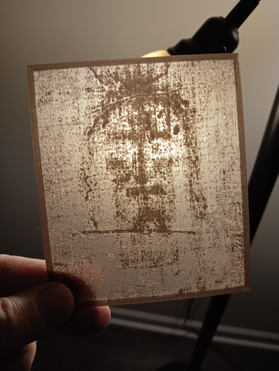 forge chapeaux envelopper of turin visage lithophane by jerry palmer génératif 3d modèle photos art 3d print model - Mito3D