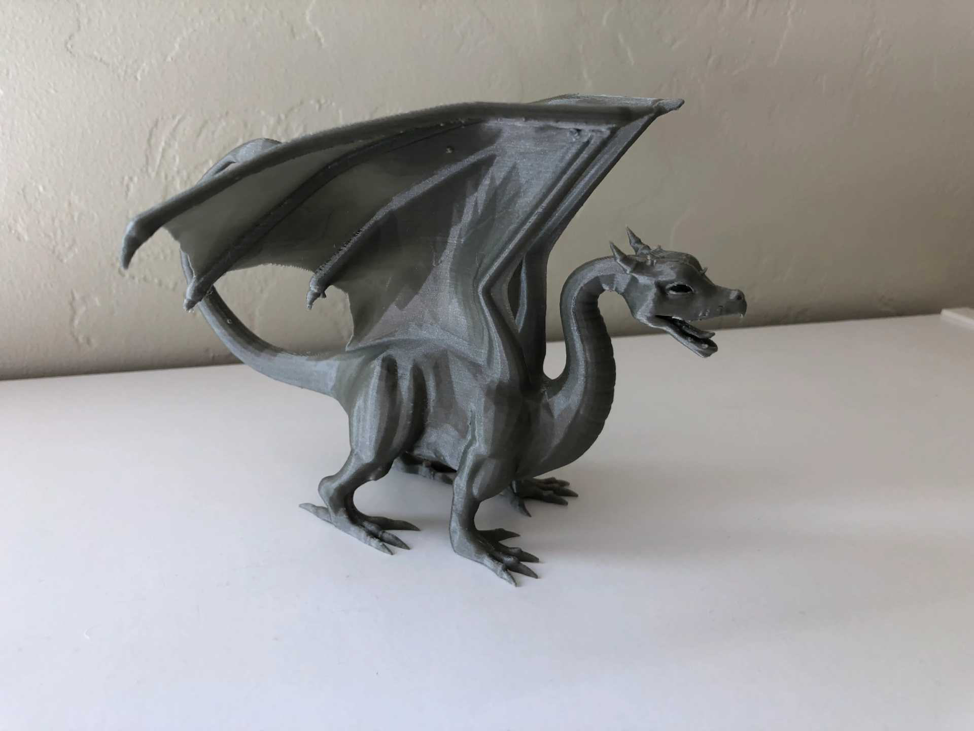 dragon by ocular dynamic miniatures creatures fantasy winged meshmixer figurine tabletop creature 3D print model - Mito3D