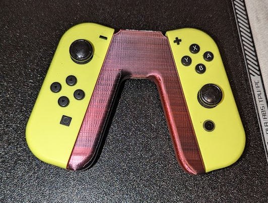 nintendo switch joy-con grip store strap by manabun - modified remixed jppotter toys & games controller joycon 3D print model - Mito3D