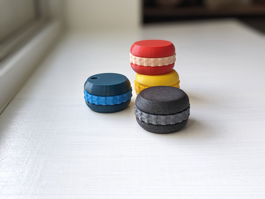 clicky macaron hilandero by juguetes juegos fidgetclicker juguete inquieto 3d print model - Mito3D