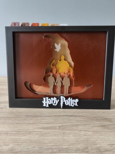 harry potier ombre boîte by rusé fabricant art panneaux logos potter film silhouette shadowbox 3d print model - Mito3D