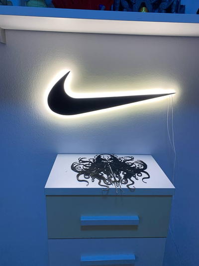 swoosh parede arte conduziu by manusm12 2d 3d print model - Mito3D