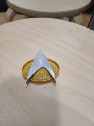 star trek tng badge by megatolusalen props & cosplays costumes halloween decoration costume space cosplay cute nerd gift kid accessory accessories communicator mom nerdy geeky accesory moment generation convention 3d print model - Mito3D