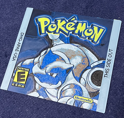 hueforge pokemon gameboy label sticker blue by chris-3dbasement generative 3d model & lithophane cartridge 3d print model - Mito3D