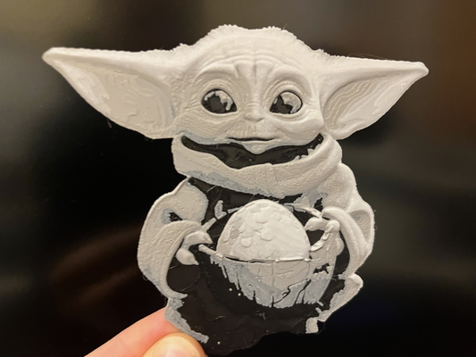 grogu baby yoda bringing easter egg star wras hueforge 3 color by mariob generative 3d model & lithophane starwars wars mandalorian ai art child midjourney 3d print model - Mito3D