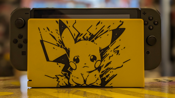 nintendo switch dock cover pikachu by angry-p1p tools gadgets pokemon 2d 2dart nintendoswitch 3d print model - Mito3D